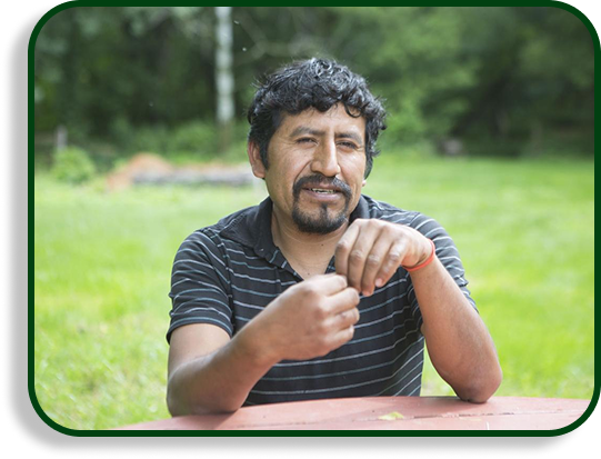 Farmer Juan sitting at table